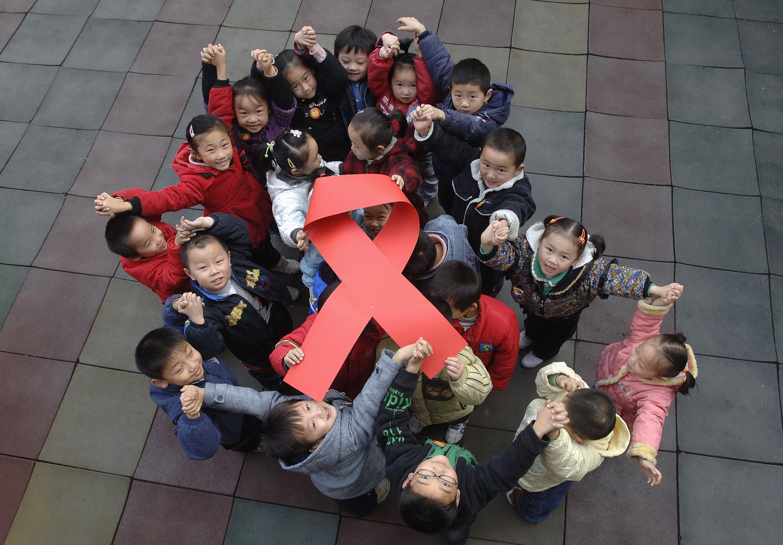 China to lift HIV\/AIDS travel ban - official