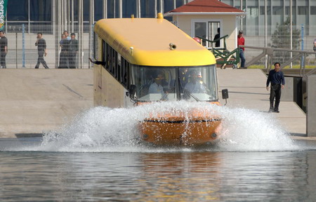 Amphibious bus carries passengers to the sea