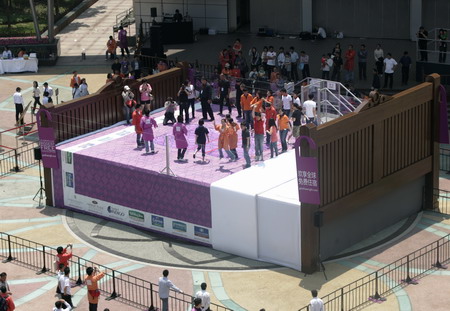 Having fun jumping on giant 'bed'