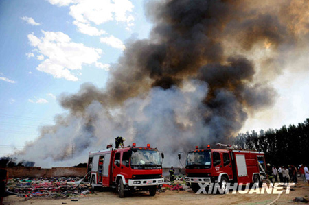 Flea market on fire in N Beijing