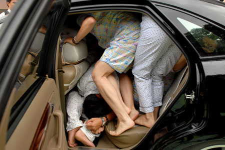 People squeeze into one car to win $73