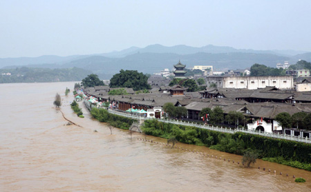 Torrential rain kills eight; five missing