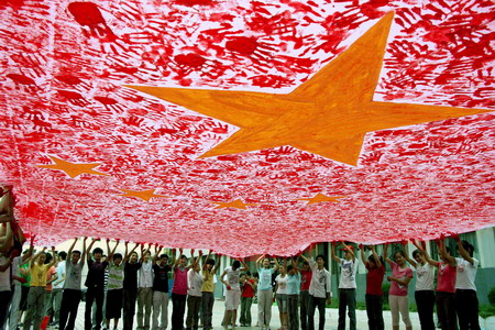 Students make national flag from hand imprints