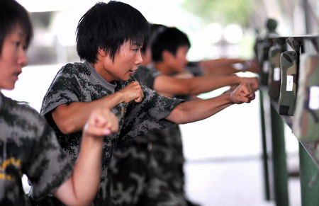 Special policewomen kick, fight and shoot during training