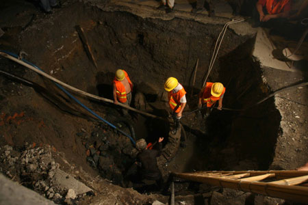 Sink holes in Beijing streets after rainstorm