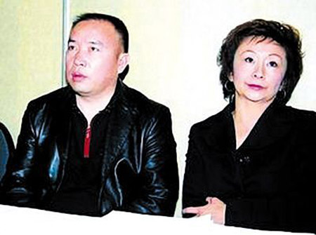 Ex-wife of China's most-wanted fugitive returns