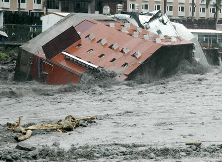 12 dead, 52 missing in Taiwan flooding: rescuers