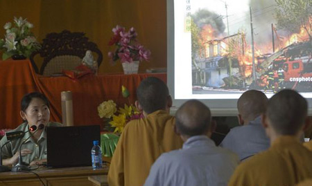 Monks at fireproofing class in central China