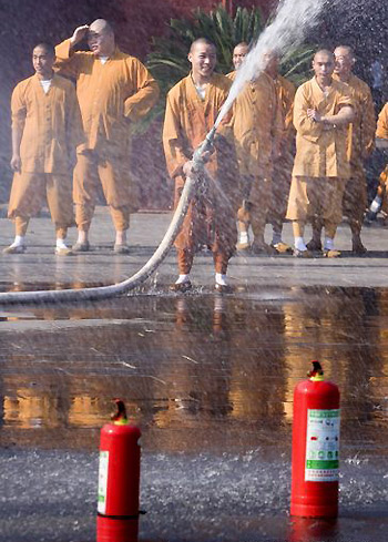 Monks at fireproofing class in central China