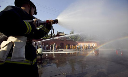 Monks at fireproofing class in central China