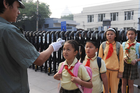 WHO: School closure can slow flu spread
