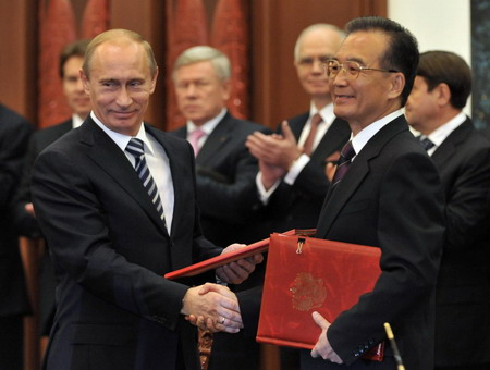 China, Russia sign 12 agreements during Putin's visit