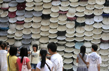 'Toilet Bowls Waterfall' displayed in Foshan