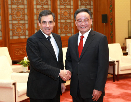 China calls for proper handling of sensitive issues amid French PM's visit