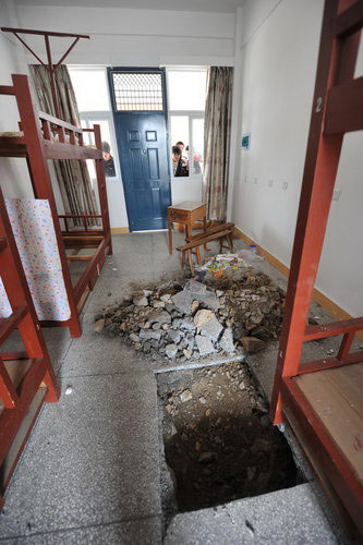 Students forced to evacuate after dorm floor caves in