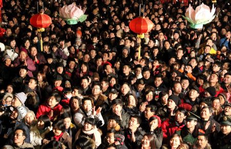 Jubilant Chinese greet New Year