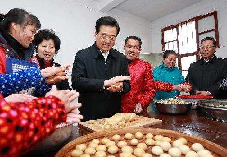 Hu urges development in revolutionary bases
