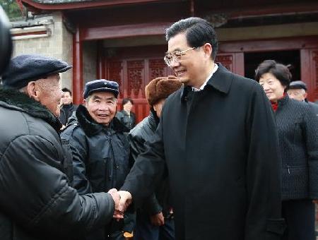 Hu urges development in revolutionary bases