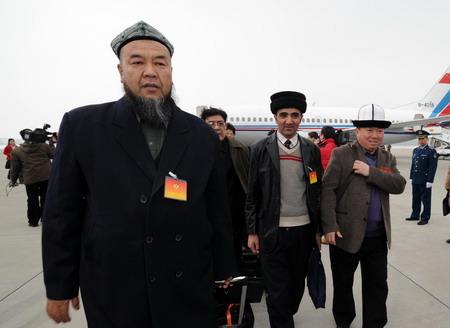 Members of CPPCC arrive in Beijing for session 