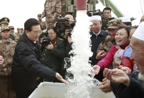 President Hu: More efforts to develop west inland
