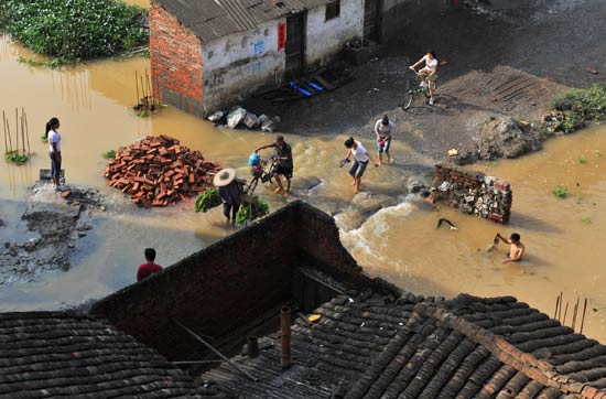 Rains kill at least 51 in Guangxi