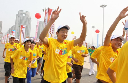 China celebrates Olympic Day with long-distance running