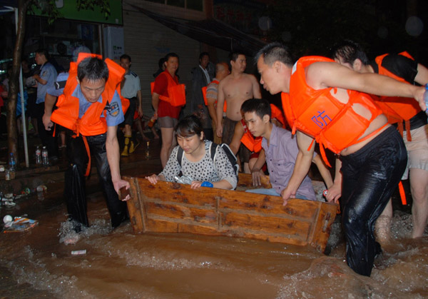 12,000 evacuated as floods wreck havoc in SW China