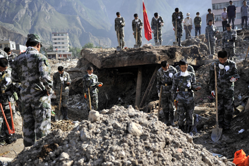 China observes day of mourning, toll rises to 1248