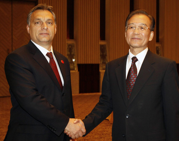 Premier Wen meets Finland, Hungary PMs