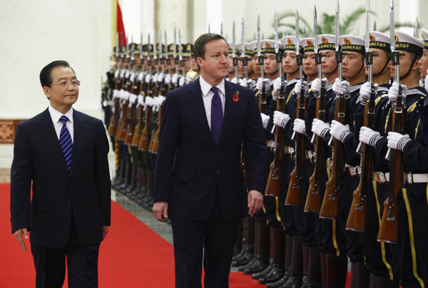 Wen, Cameron exchange views on bilateral ties