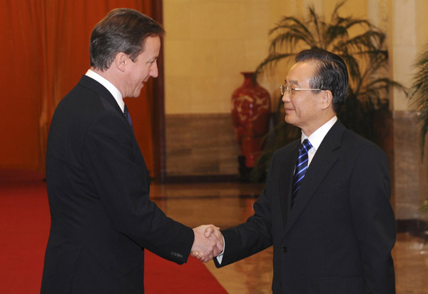 Wen, Cameron exchange views on bilateral ties