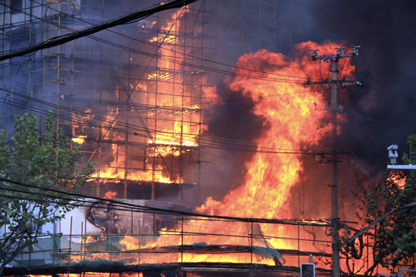 42 killed in high-rise building fire in Shanghai