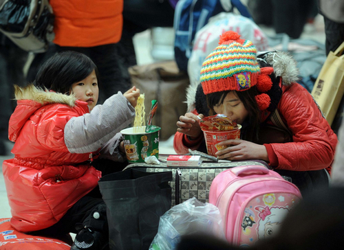 China begins annual Spring Festival travel rush