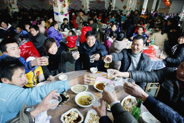 Chinese people toast for a better Year of the Rabbit