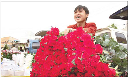 Desire for Valentine's roses pushing up prices