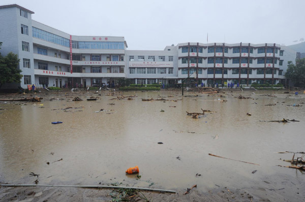 China floods kill 52 people