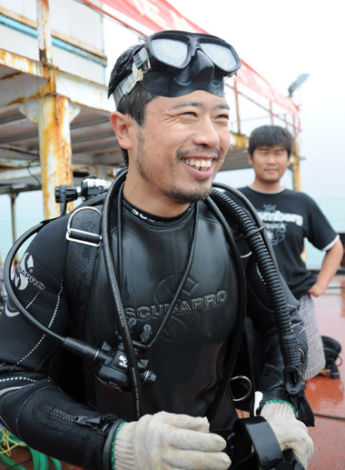 Liu Zhiyuan, a 34-year-old underwater archaeologist, is fresh out of water on the workboat excavating the 400-year-old sunken ship Nan'ao No 1 near Nan'ao Island in Guangdong