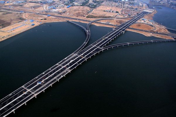 China opens world's longest sea bridge