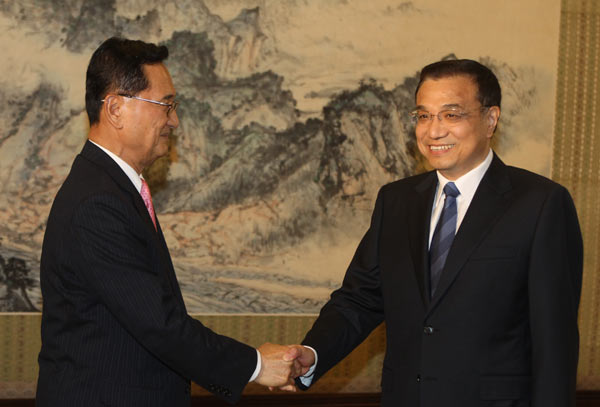 Li pledges to boost inter-party ties with ROK
