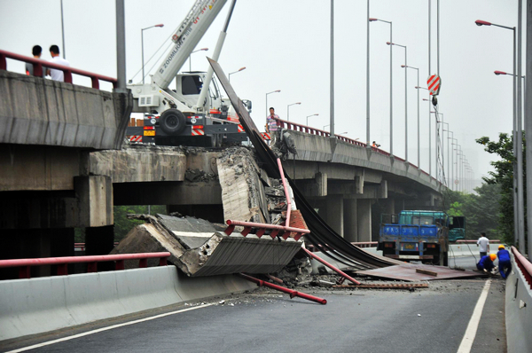 Truck driver injured in bridge cave-in