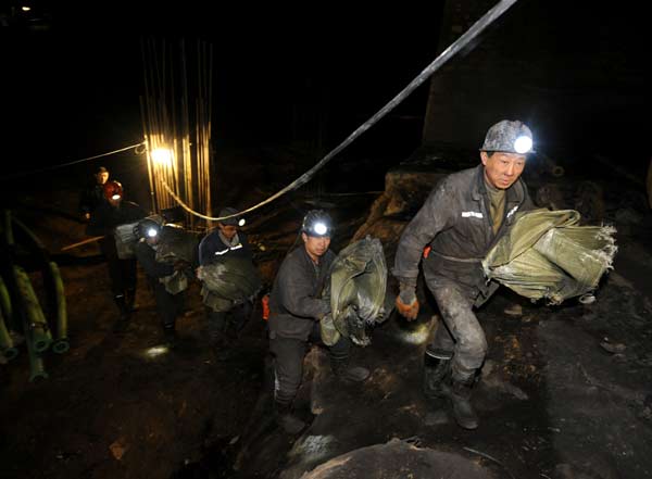 Rescuers racing to find trapped miner
