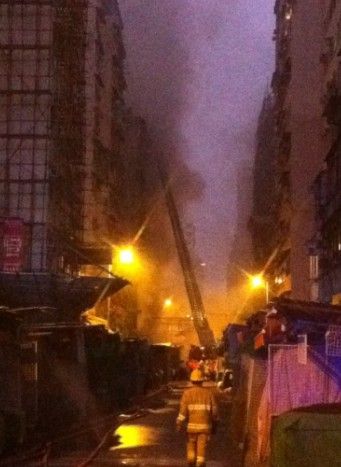 8 dead, 24 injured in HK downtown fire