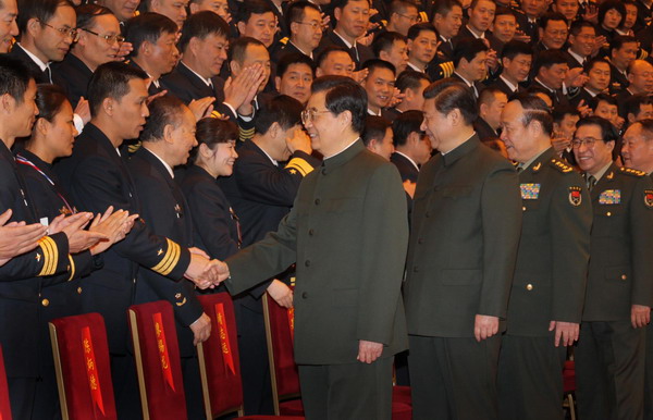 President Hu meets deputies for military meetings
