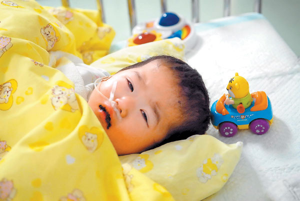 Injured toddler's dad held