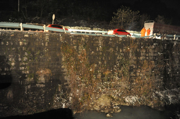 At least 18 killed after tourist bus falls off highway bridge in SW China