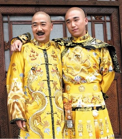 Zhang Mo (R) and his father Zhang Guoli in costume. Actor nabbed in Beijing over marijuana