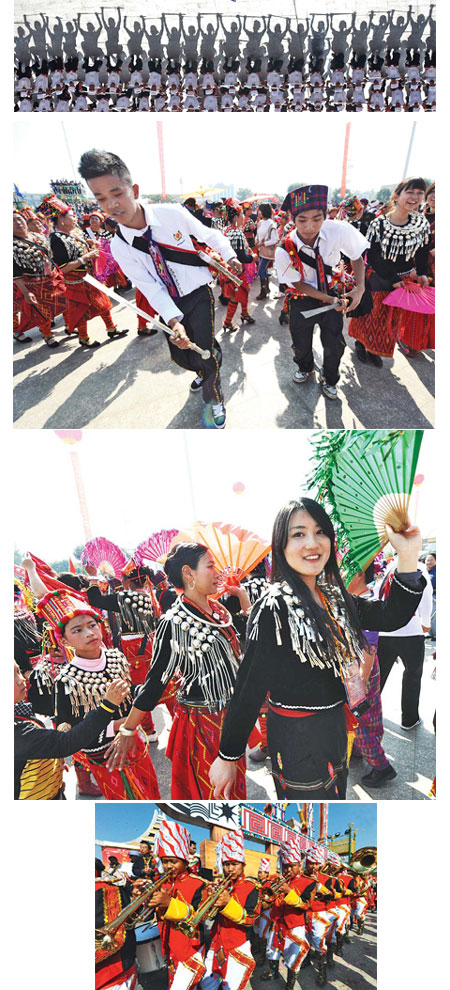Munao zongge means singing and dancing in the Jingpo language of Yunnan province, and this year's recent International Dehong Munao Zongge festival brought more than musical fun: Two world records were set. Everybody dance!