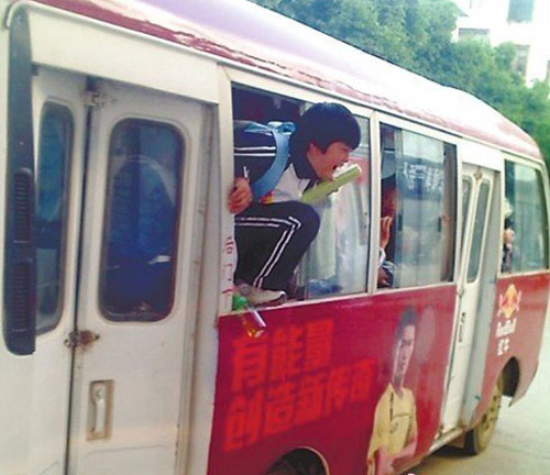 Students jump out through windows of crowded bus
