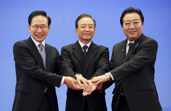 Trilateral meeting kicks off in Beijing