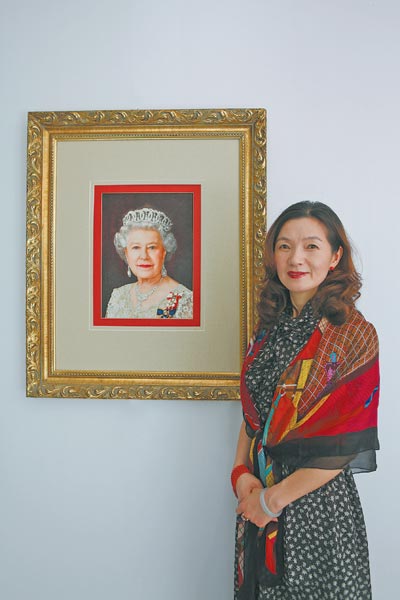 A queen of embroidery creates a royal portrait